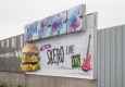 Zum Anbeißen: James Cottriall und Big Mac rocken EPAMEDIA Plakate © EPAMEDIA